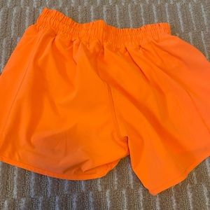 Orange 4 inch Hotty hots Lululemon